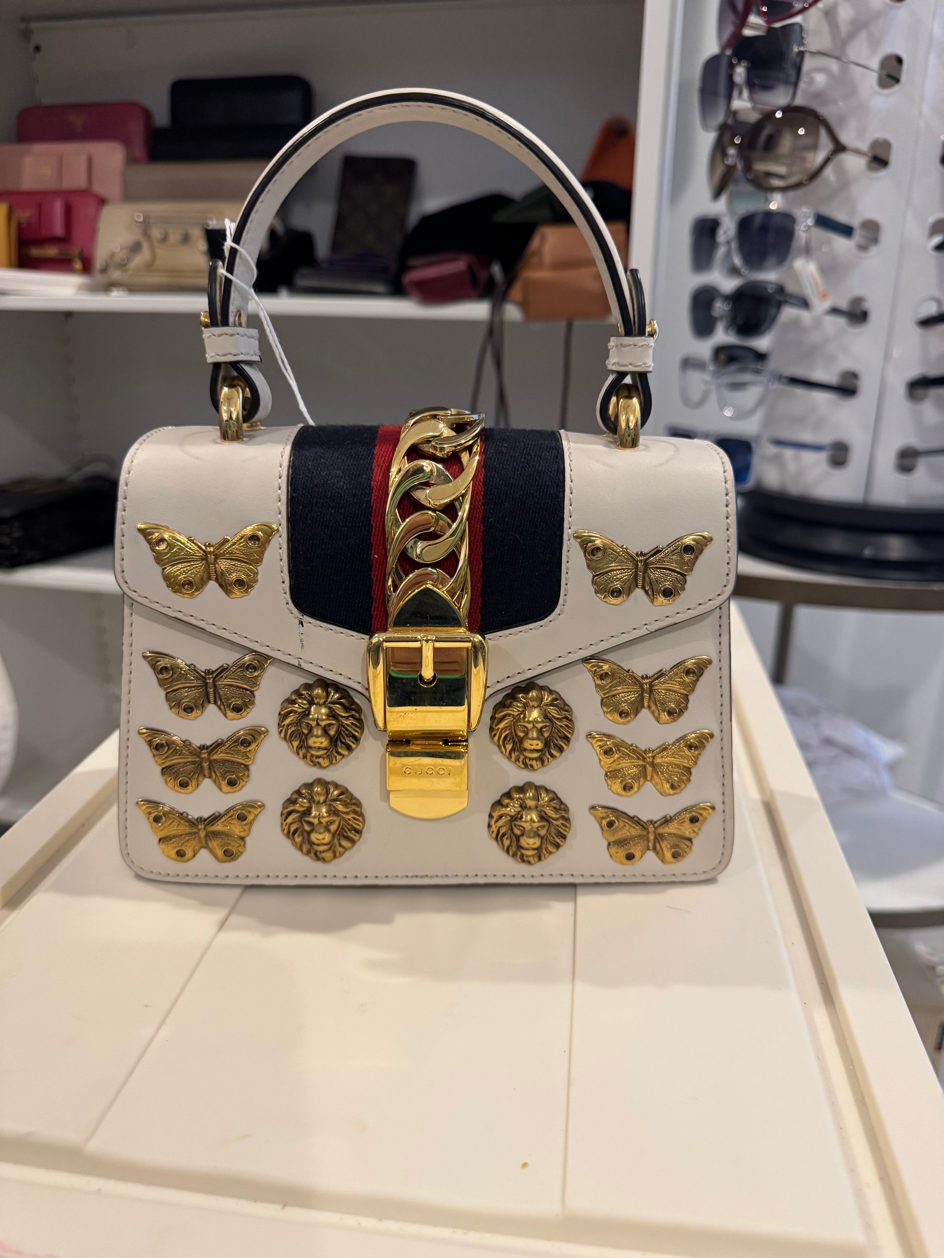 Gucci White Leather Mini Sylvie Top Handle Bag with Lion Head & Butterfly Studs