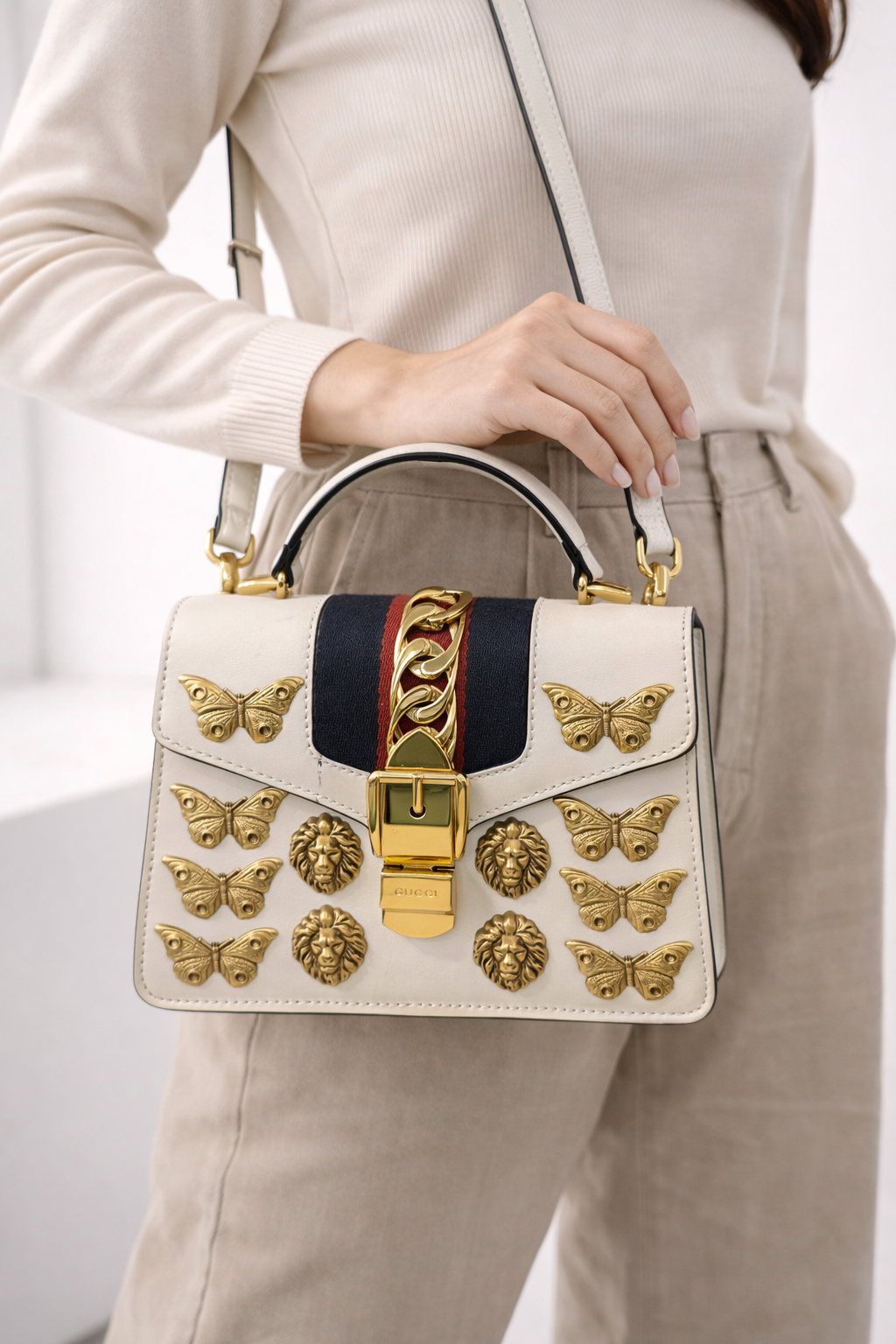 Gucci White Leather Mini Sylvie Top Handle Bag with Lion Head & Butterfly Studs